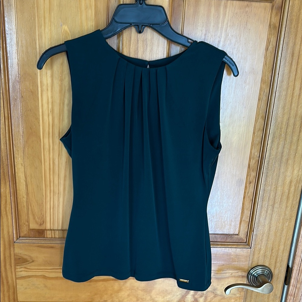 Green Calvin Klein sleeveless blouse